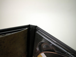 Hardbound cd book stapled booklet glued to panel