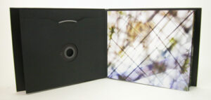 Oversized custom jacket black matte paper swinging sleeves 2 cd set inner pages