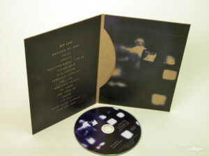 Fiberboard jacket 4C/0C with wide thumbhole pocket to hold dvd disc