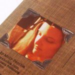 Embossing on scrap book photo corners custom cd packaging vintage look embossed touches