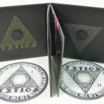 CD Book with foam hubs to hold discs, one on each inside panel, inner pages stapled