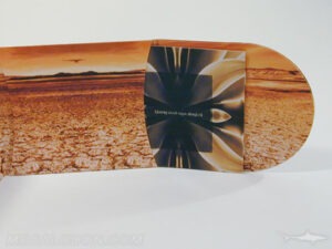custom cd packaging curved end panel and outward facing booklet pocket