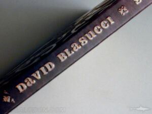 Embossed spine on digipak, spot ink matte lamination