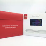 Video mailer with 4.3 inch screen and pocket to hold literature Nissan