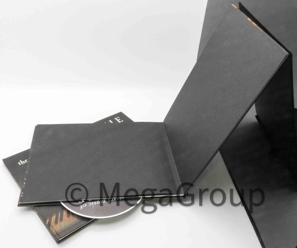 Open view of cd book showing inner wrap black matte material, 6x8 inches